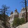 Hoodoos from volcanic tuft along slot canyon trail at Tent Rocks.