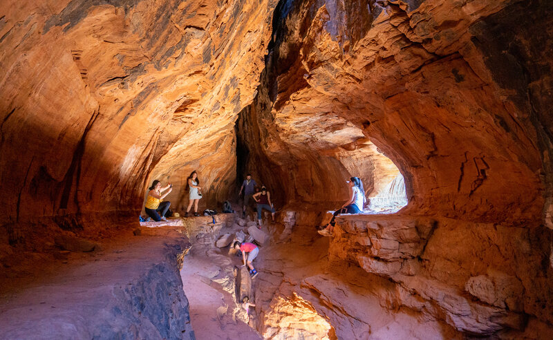 Hikers inside the Soldier Pass Cave