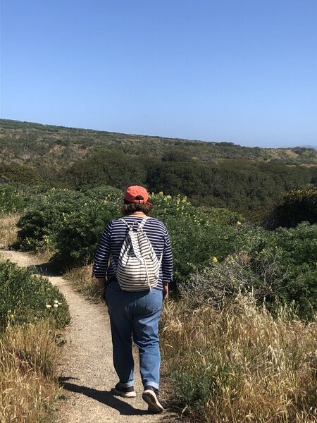 Mom hiking ahead of me on the trail.