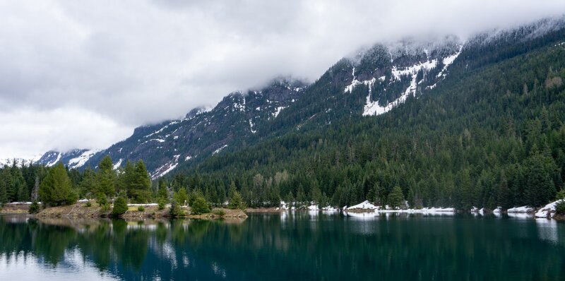 Snowy mountains over Gold Creek Pond.