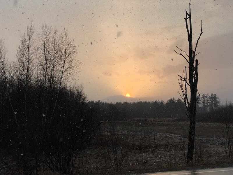 The snow looks like ash from the burning sun.