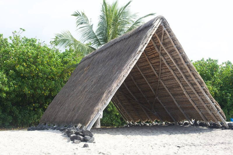The Canoe House on the beach provides some shade and insight into