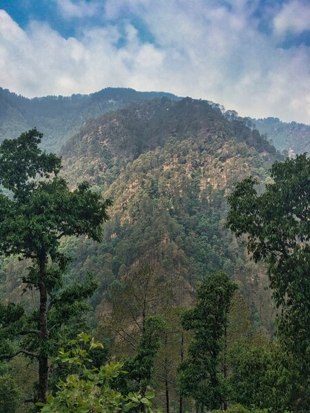 Looking across from the descent, at the spur one climbs back up to Landour.