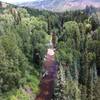 From Tiehack Bridge, Maroon Creek trail is hidden in the trees to the left of the Creek. MC trail ends after a short climb just beyond the Highway 82 bridge in the distance.