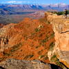 Checking out the views of distant Zion National Park from the north rim of Gooseberry Mesa.