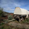 An old wagon next to the parking area reminds you of travelers from long ago.