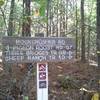 Signage at the Rockcrusher Rd and Lost Cemetery Trailhead