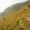 Approaching the staircase high above terraced fields.