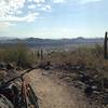 Getting ready to head downhill. The mountain in the distance are a part of the Sonoran Figure 8