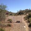 North entrance gate to Cave Creek Regional Park. Take the Go John Trail to the right. This trail is heavily used by hikers so be careful and courteous.