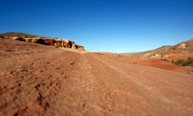 The brightly colored, fine-grained Entrada Sandstone makes for an incredible riding surface.