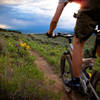 Scott Fleming rides the upper meadow of Boneyard at sunset.