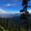 La vista desde el mirador en lo alto viendo al sur de la ciudad de México, los volcanes, el parque nacional Los Dínamos, y el volcán Ajusco
