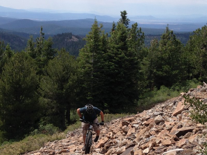 Traversing a rockslide on the Cougar Peak ascent.