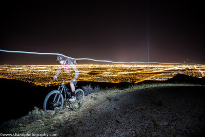 Aaron Thomas rounding the bend with the strip in the distance. SW Ridge