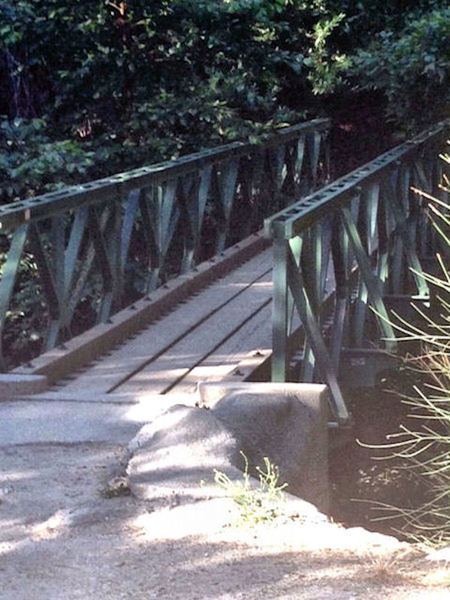 Foot bridge at Robert's Camp.  Cross the bridge or ride through the creek and start the climb up the paved fireroad to the Chantry Flat parking lot.