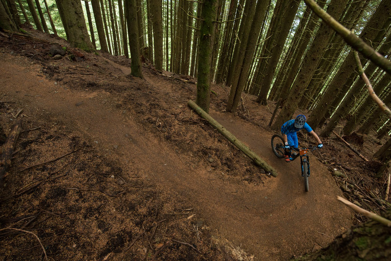 Neal Strobel winds his way up to the descent on Predator.