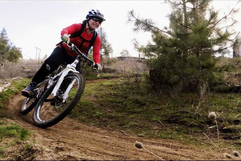 Enjoying the downhill on the spring dirt.