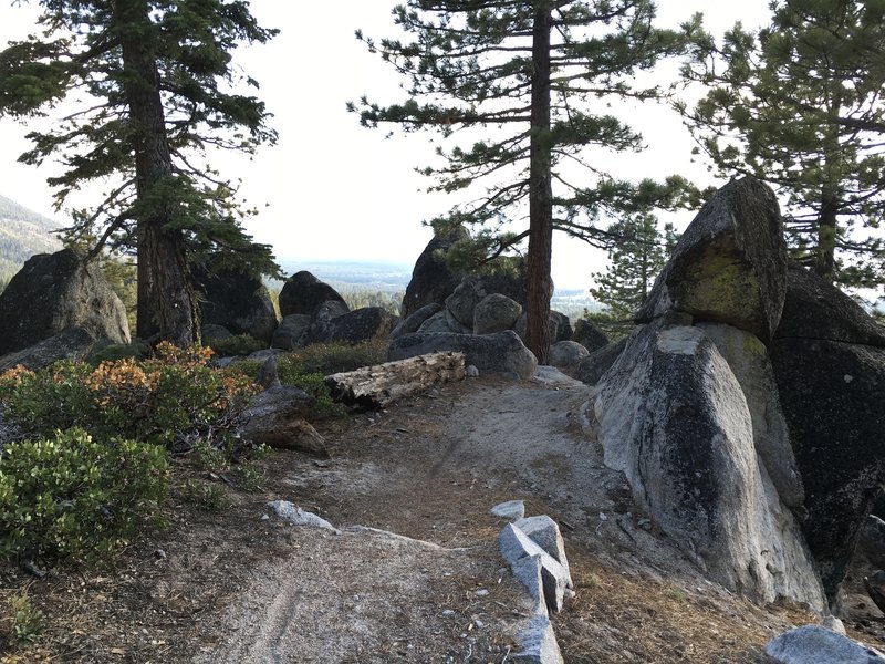 Kingsbury Loop. Looking back on a fun short technical section through the boulders. South Tahoe in the distance.
