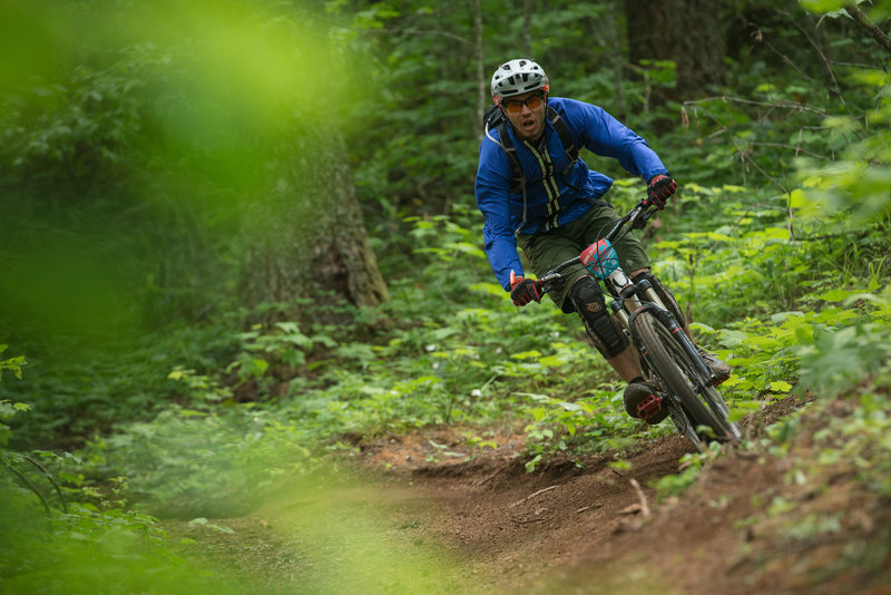 Riley Ghio rides the edge of a particularly fast berm on Dirt Surfer (170) during the Cascadia Dirt Cup.