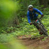 Riley Ghio rides the edge of a particularly fast berm on Dirt Surfer (170) during the Cascadia Dirt Cup.