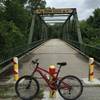 The bridge is a walk/bike bridge over the Smoky Hill river.