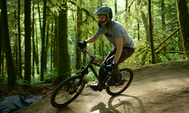A rider takes the high line on the dual-slalom "Deuces Wild" at Duthie Hill Park, WA.