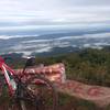 View from Reddish Knob. The rock to the right of the bike is the top of Timber Ridge Trail.