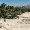 Riding down an awesome slickrock stretch on Little Creek Mesa.
