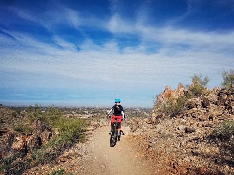 A rider enjoys the view along the Dynamite Trail.
