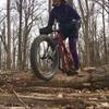 Julia Bucksaws a logover on Trail B.