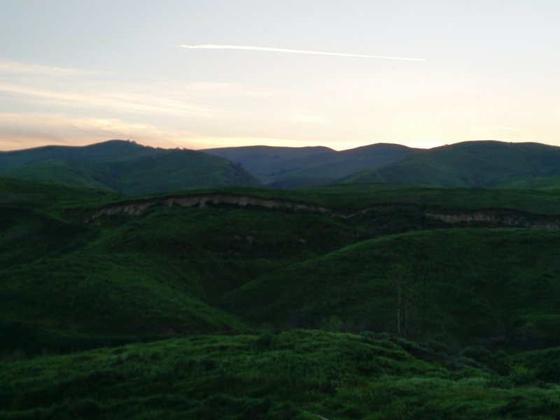 The last glimmer of light streaks across the sky along the South Ridge Trail.
