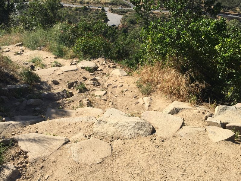This chunky terrain is certainly more fun on the way down than on the way up.