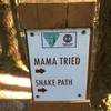 Sign for Mama Tried and Snake Path.