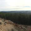 Panorama from the overlook on an overcast day. Lake Allatoona is on the left. The city of Cartersville on the right, and Kennesaw Mountain can often be seen off to the middle left.