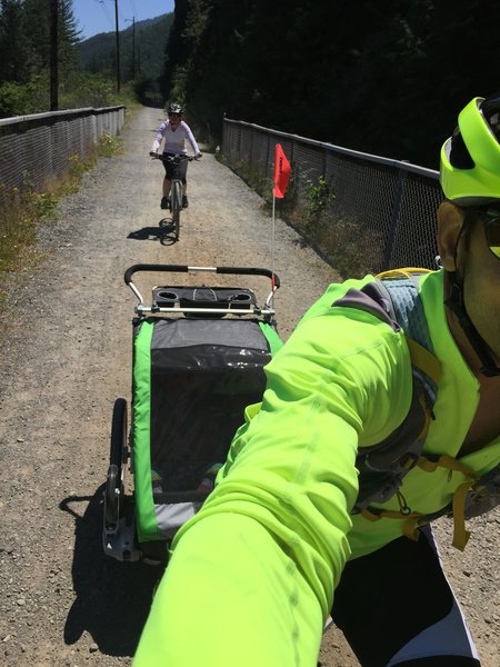 The trail is smooth and wide... we rode the trail with our two kids in the trailer.  You can ride it with a typical hybrid bike or a cyclocross too.