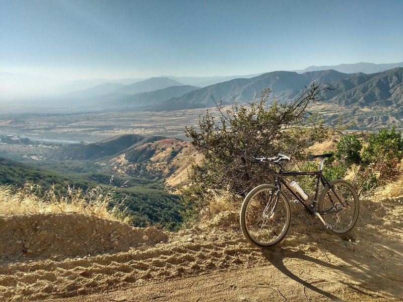 Trail is plenty fine even for old school mountain bikes.  This last week (July 19ish 2017) it was graded and for right now has a patchy mix of hardpack, small rocks, and loose dirt.