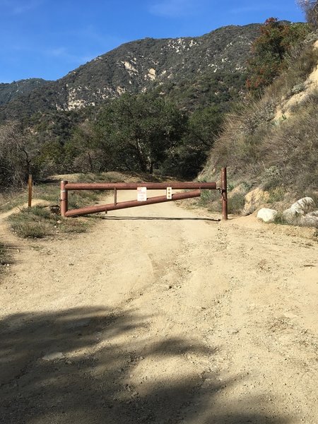 Gate restricting vehicles up the trail, easy to ride around, at the ...