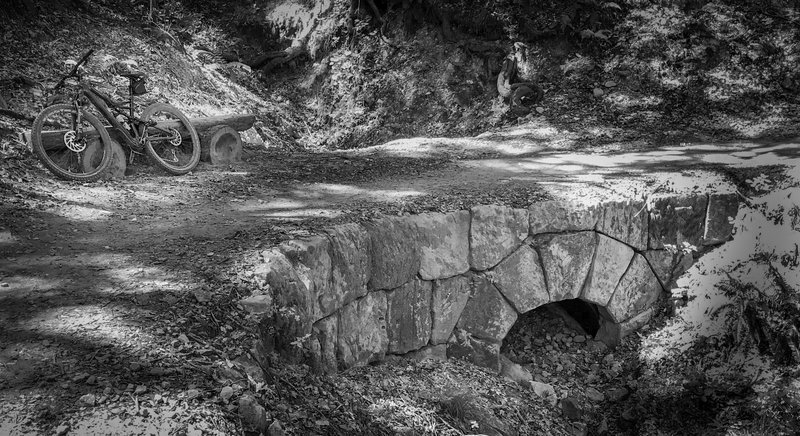 Rock bridge on John Nicolas Trail. The trail is noted for it's excellence in design and the nice architectural/landscape additions such as this bridge and the benches at various locations such as the viewpoint.