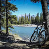 The trail drops down to the Bow River