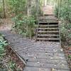 Stairs on trail with bike bypass around.