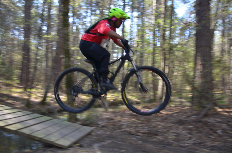 this racer was fast   Great air on the Big Enoch Creek Jump.   He had a long and smooth jump !