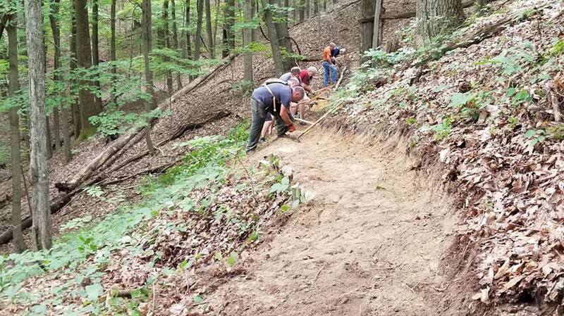 More bench work on a steep slope.