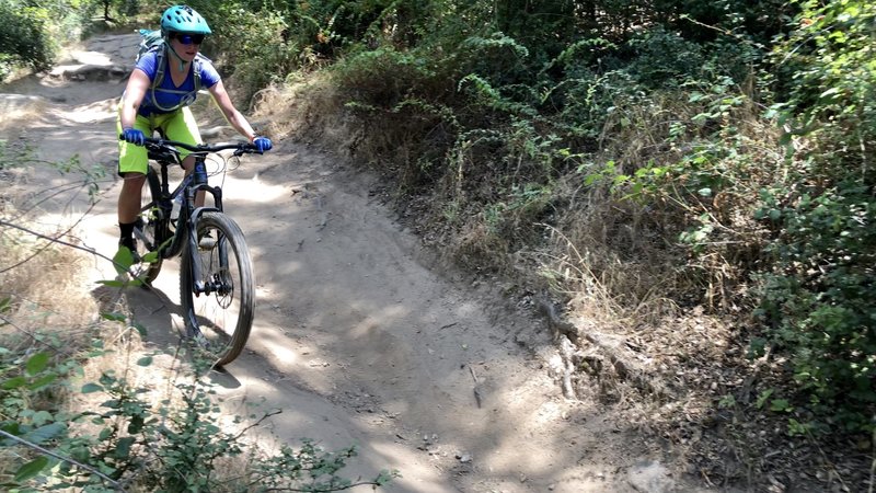 Jen keeping it rolling through dusty ruts. Great trail for the area!