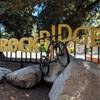 Mountain bike in front of the sign outside Rockridge BART station. Where a lot of fun begins!