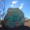 The Copper Boulder is difficult to miss! Just south of the intersection of Matt's Loop East & Mordedura de Serpiente.