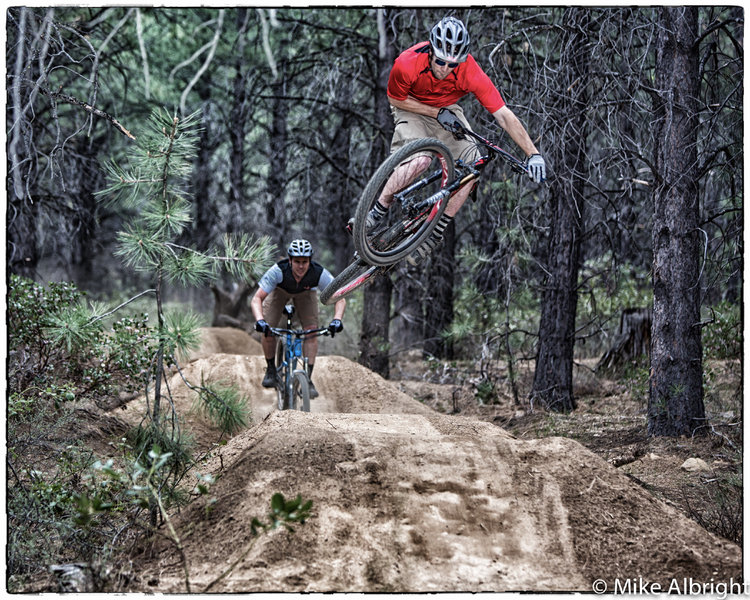 Bend local Kirt Voreis airs it out over some of the jumps on Lower Whoops near Bend, Oregon.
