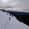 Skinning back up and working to the north and east looking for deeper snow.