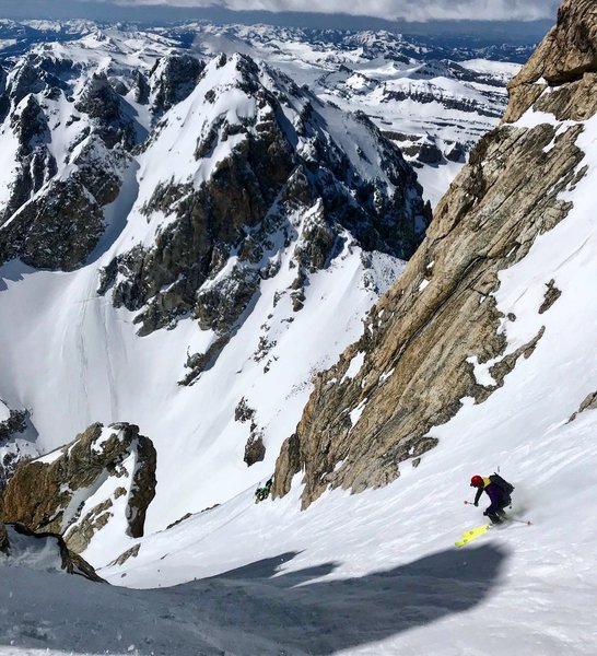 Skiing the bottom part of the Ford Couloir, the Middle Teton is in the background.