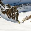 Skiing down Conundrum Couloir in hard conditions.